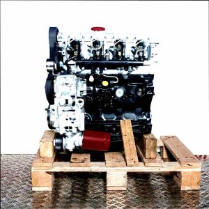 Side view of engine 8140.43S (F28DTCR) on a wooden pallet against a white background. The engine displays components such as fuel injectors and belts.