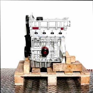 Side view of a BCA engine on a wooden pallet against a white background. The engine is shown in high detail and sharp focus.