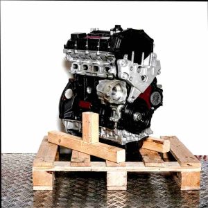 BCCC engine on a wooden pallet against a white background. Side view of the engine, positioned vertically.