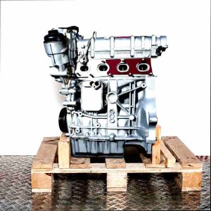Side view of a silver BLF engine on a wooden pallet against a white background. The engine's components are clearly visible.