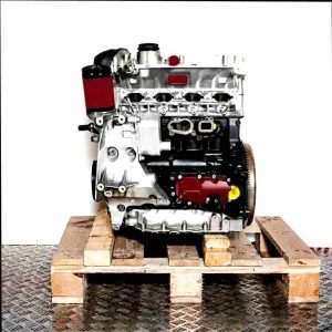 Side view of a BPY engine on a wooden pallet against a white background. The engine is fully visible.
