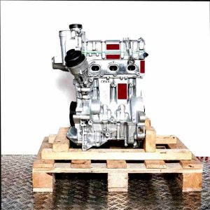 BZG engine on a wooden pallet against a white background. This side view showcases the engine, including the oil filter and intake manifold.