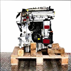 CAHA engine on a wooden pallet against a white background. The engine, in gray and black tones, has yellow markings.