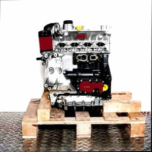 CAWB engine on a wooden pallet against a white background. The silver and black engine is viewed from the side.