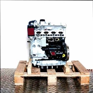 CDAA engine on a wooden pallet against a white background. The silver and black engine with oil filter is shown from the side.