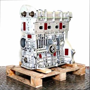 Side view of a CGGB engine on a wooden pallet against a white background. The engine is vertically oriented.
