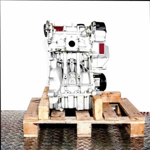CHYB engine on a wooden pallet against a white background. Front view of the silver engine.