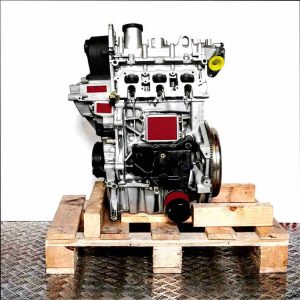 Side view of a complete CHZL engine on a wooden pallet against a white background. The engine is vertically oriented.