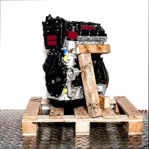 CJXG engine on a wooden pallet against a white background. The black and silver engine is viewed from the side, with yellow fasteners visible.