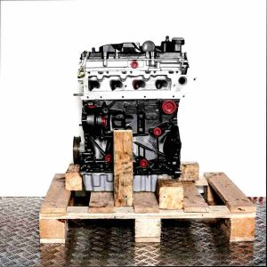 Side view of a CLHB engine on a wooden pallet against a white background. The engine, featuring silver, black, and yellow accents, is fully visible.
