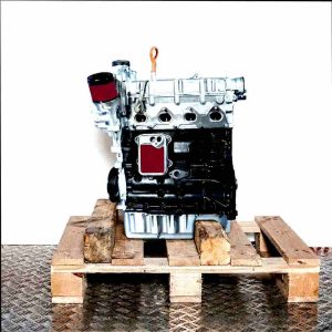 CTHA engine on a wooden pallet against a white background. The engine, partially black and silver, is viewed from the side and oriented vertically.