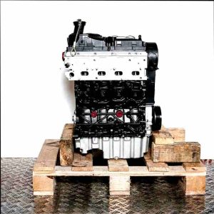 CXGB engine on a wooden pallet against a white background. Black, silver, and yellow details. Vertical orientation.