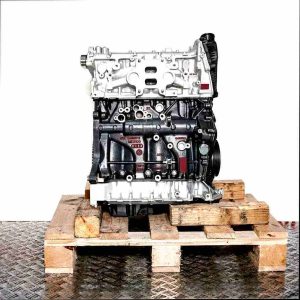 CZPA engine on a wooden pallet against a white background. Side view of the black and silver engine.