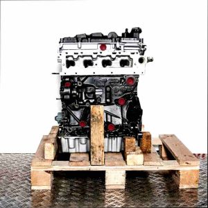 DGTD engine on a wooden pallet against a white background. The gray and black painted engine with yellow markings is vertically oriented.