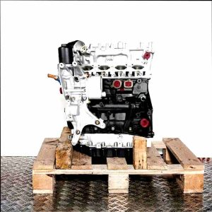 DNUC engine on a wooden pallet against a white background. The silver and black engine is shown from the side.