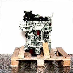 HNS (EB2ADTS) engine on a wooden pallet against a white background. Side view of the silver engine with black covers and a blue element.