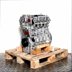 SFJJ engine on wooden pallet against a white background. The image showcases the fully assembled engine from a side perspective, highlighting the front cover and attachments.