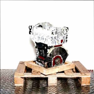 SFJP engine on a wooden pallet against a white background. The image shows the engine from a slightly angled side perspective.