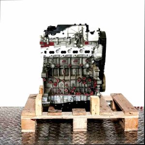 T8CI engine on a wooden pallet against a white background. Side view of the engine, no watermarks or logos.