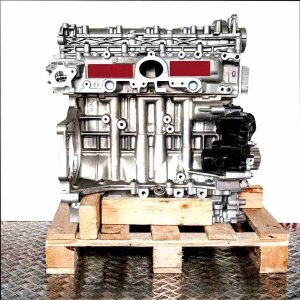 Engine YHZ (DV5RC) on a wooden pallet against a white background. The silver engine with black components is viewed from the side.