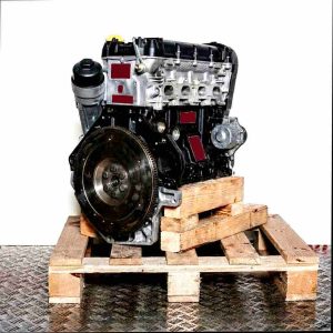 Z 12 XEP engine on a wooden pallet against a white background. The flywheel is clearly visible. Side view of the engine.