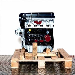 Side view of a Z 16 XEP engine on a wooden pallet against a white background. The silver and black engine displays components like oil filters and connectors.